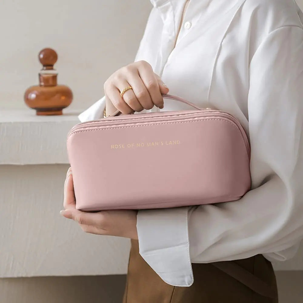 Water-resistant PU leather cosmetic bag shown with water droplets

